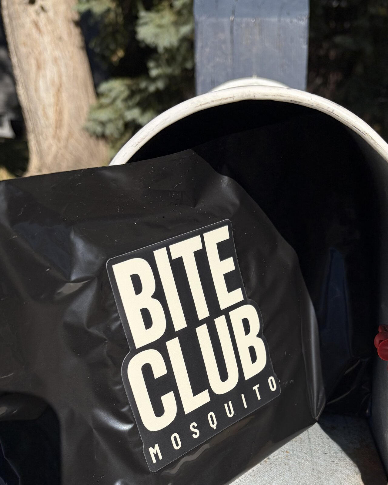 Bite Club Mosquito refill mailer in a mailbox